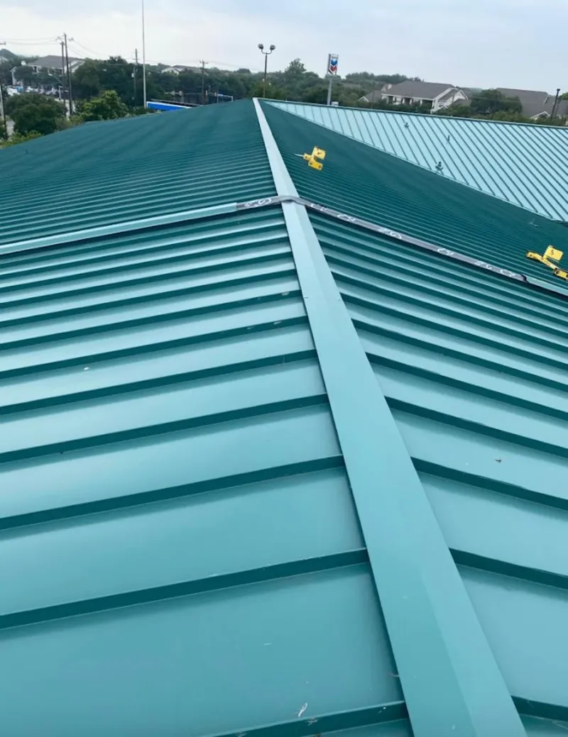 Green commercial metal roof ridge and valley for Metal Roof Repair in Altamont